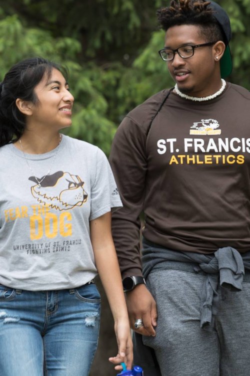 smiling students walking