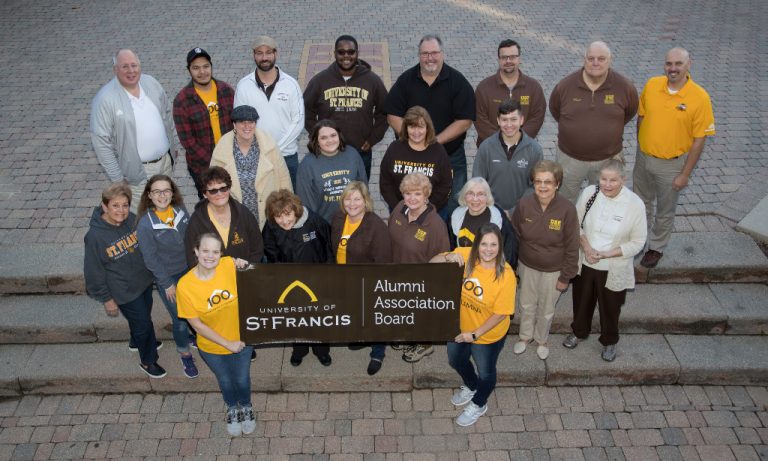 group of smiling USF alumni