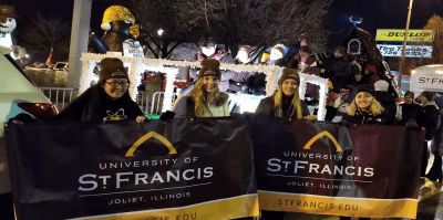 USF students at the Light Up the Holidays Parade