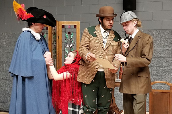 drama club with students on stage