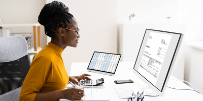 woman sitting at a computer