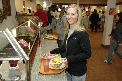 smiling student with food