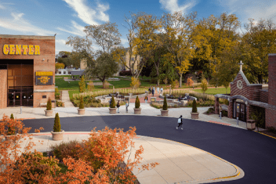 outdoor green spaces with students walking