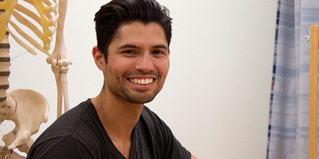 headshot of smiling man